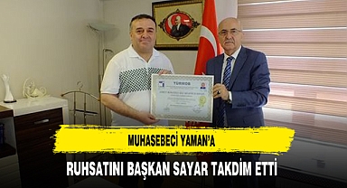 Muhasebeci Yaman’a Ruhsatını Başkan Sayar Takdim Etti