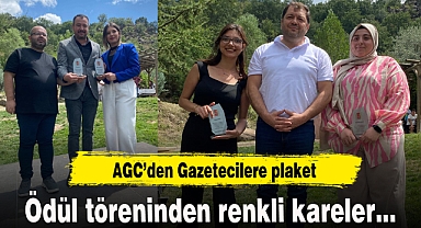 AGC'den Gazetecilere plaket