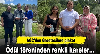 AGC'den Gazetecilere plaket
