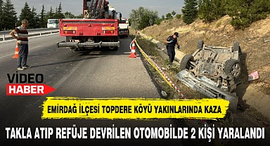 TAKLA ATIP REFÜJE DEVRİLEN OTOMOBİLDE 2 KİŞİ YARALANDI