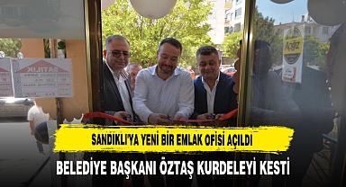 Sandıklı'ya Yeni Bir Emlak Ofisi Açıldı Belediye Başkanı Öztaş Kurdeleyi Kesti