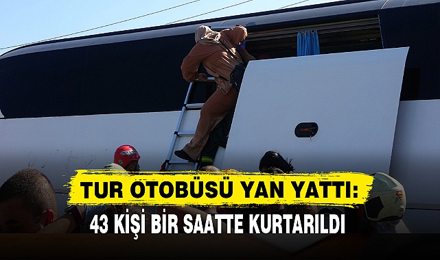 TUR OTOBÜSÜ YAN YATTI: