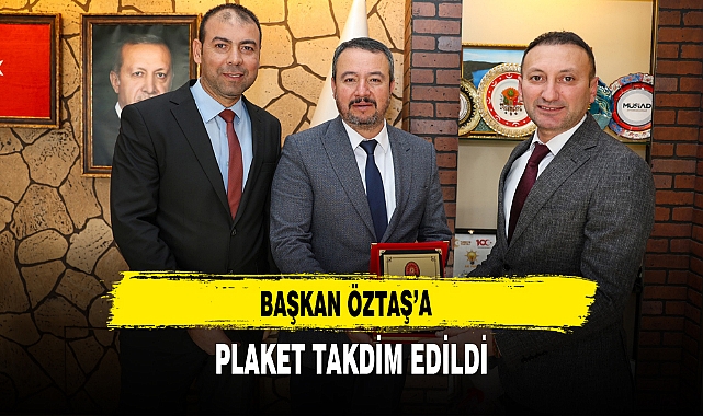 BAŞKAN ÖZTAŞ’A PLAKET TAKDİM EDİLDİ