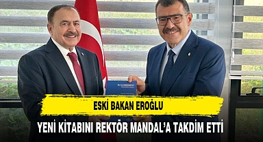 Eski Bakan Eroğlu Yeni Kitabını Rektör Mandal’a Takdim Etti