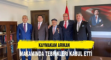 KAYMAKAM ARIKAN MAKAMINDA TEBRİKLERİ KABUL ETTİ