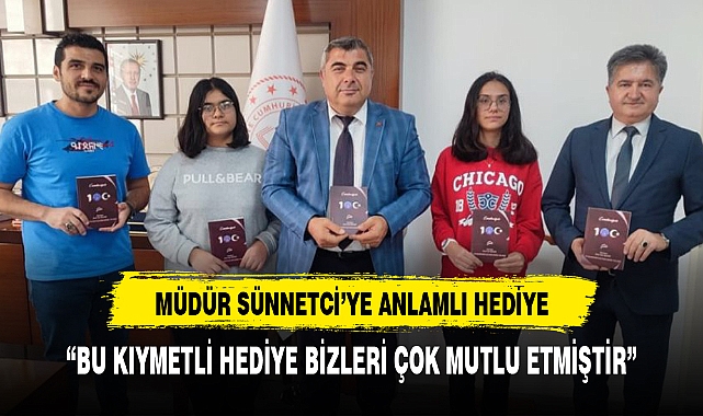 MÜDÜR SÜNNETCİ'YE ANLAMLI HEDİYE