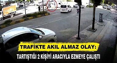 TRAFİKTE AKIL ALMAZ OLAY: TARTIŞTIĞI 2 KİŞİYİ ARACIYLA EZMEYE ÇALIŞTI