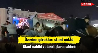 Üzerine çıktıkları stant çöktü: Stant sahibi vatandaşlara saldırdı