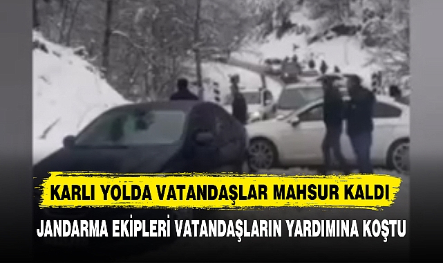 KARLI YOLDA VATANDAŞLAR MAHSUR KALDI