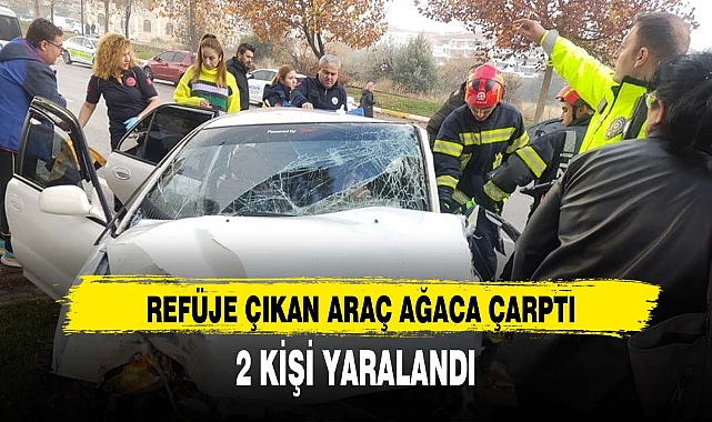 REFÜJE ÇIKAN ARAÇ AĞACA ÇARPTI, 2 KİŞİ YARALANDI