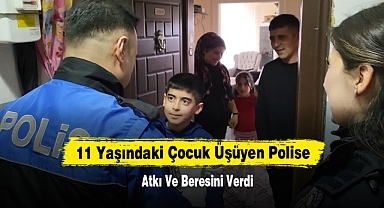 11 Yaşındaki Çocuk Üşüyen Polise Atkı Ve Beresini Verdi