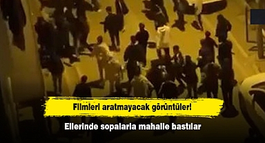 Filmleri aratmayacak görüntüler! Ellerinde sopalarla mahalle bastılar