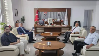 Uşak Ağır Ceza Reisi Sinan Özbek'ten Müdür  Sünnetci'ye Ziyaret