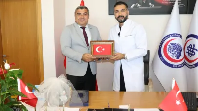 Müdür Sünnetci’den AFSÜ Başhekimine Hayırlı Olsun Ziyareti