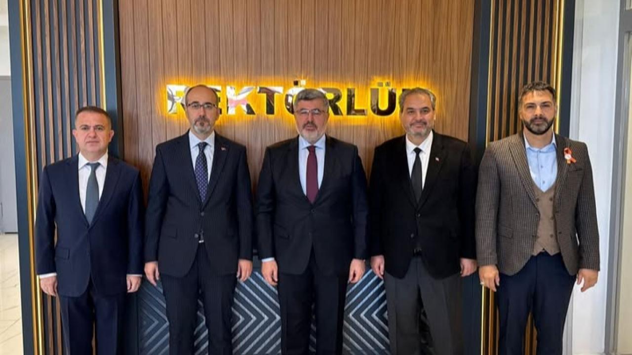 Müdür Öztürk ve Milletvekili Özkaya, AFSÜ Rektörü Aslan’ı Ziyaret Etti