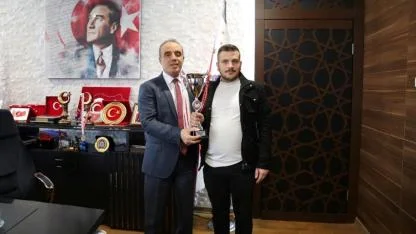 Şampiyondan Erol'a Ziyaret